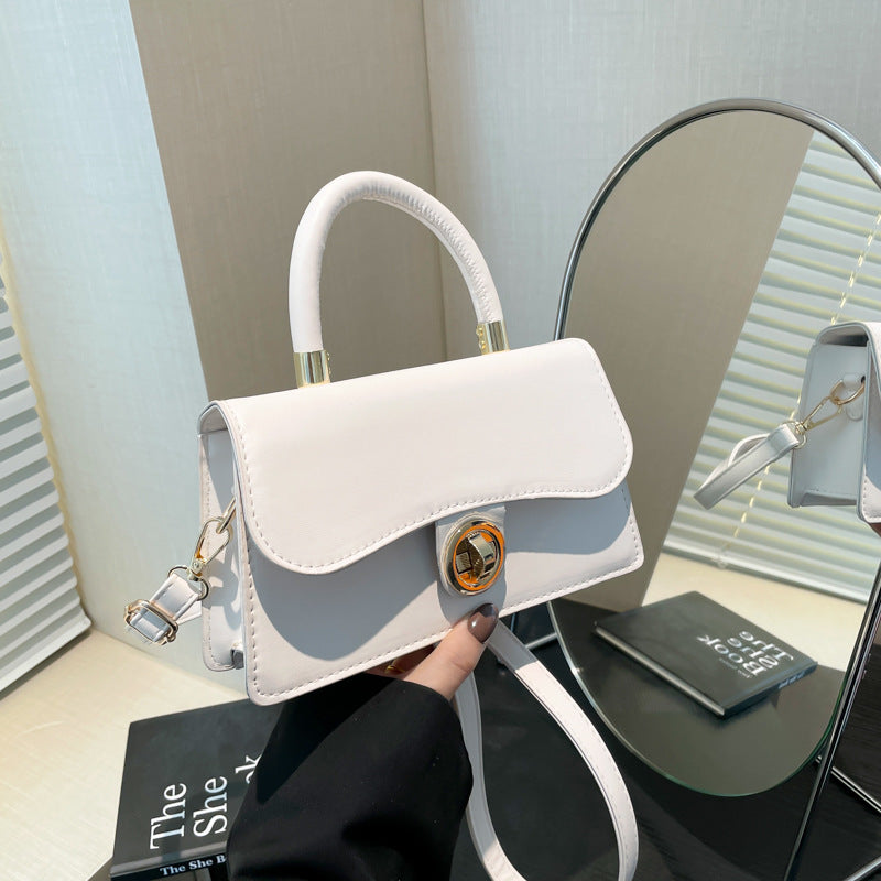K Spring Womens Commuter Light-Luxury Solid-Colored Crossbody Bag With Lock Closure