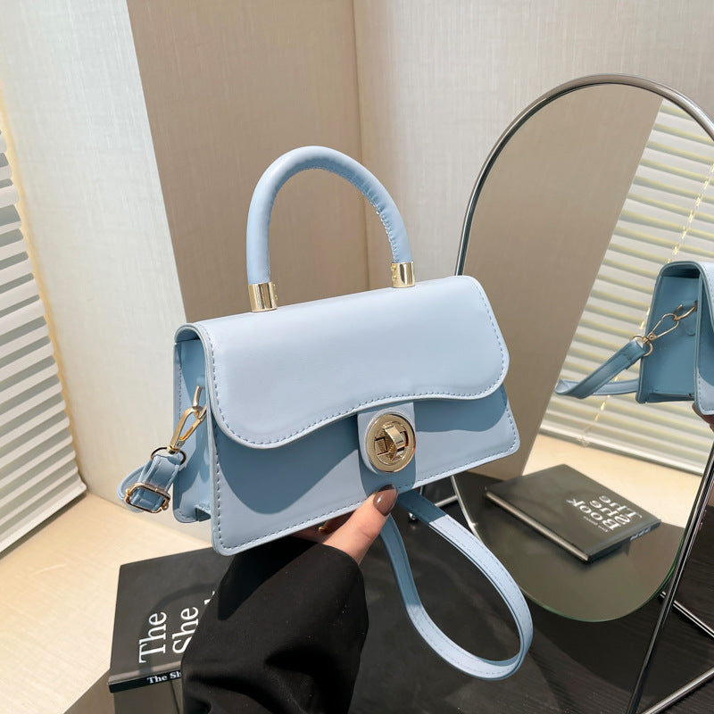 K Spring Womens Commuter Light-Luxury Solid-Colored Crossbody Bag With Lock Closure