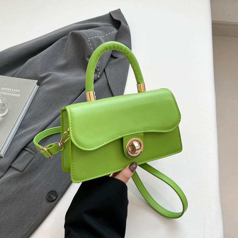 K Spring Womens Commuter Light-Luxury Solid-Colored Crossbody Bag With Lock Closure